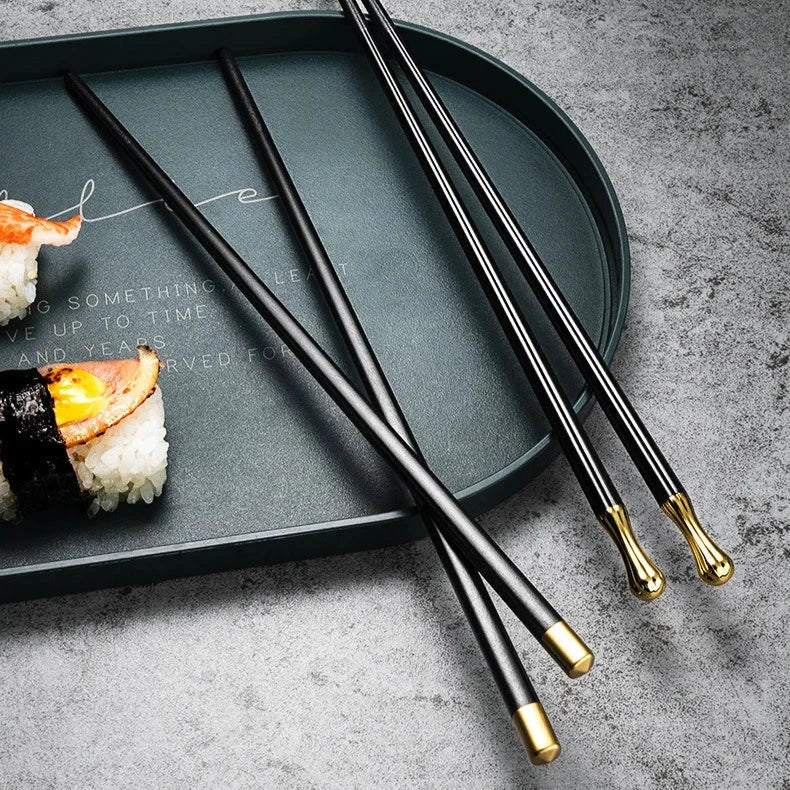 AMICI™ Zwart-Gouden Chopsticks – Een luxe toevoeging aan jouw tafel